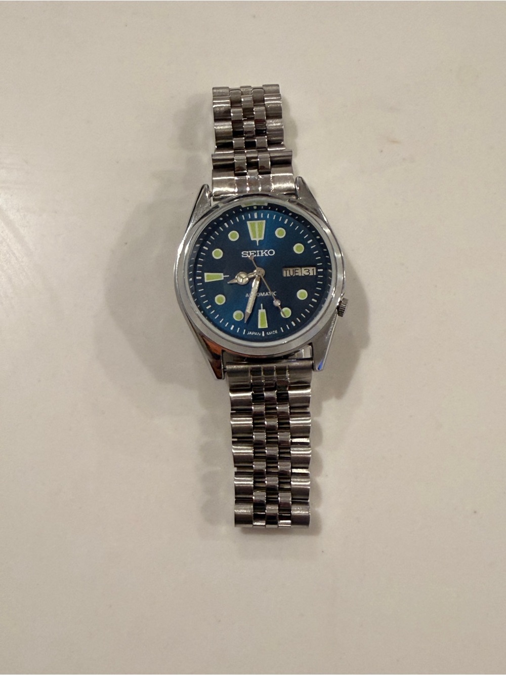 Vintage Seiko Blue Green Dial Men's Watch with Silver Jubilee Bracelet